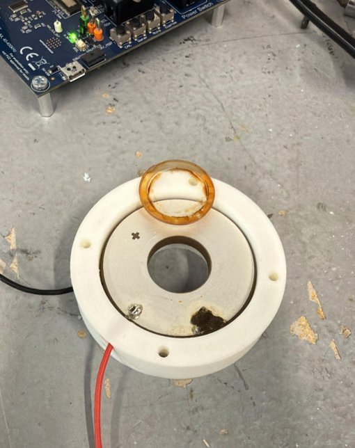 Failed prototype with the lens detached from the piezo ring