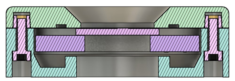 Cross-section of the assembled housing showing the lens and piezo suspended on the film
